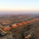 An aerial view of a partially built housing development.